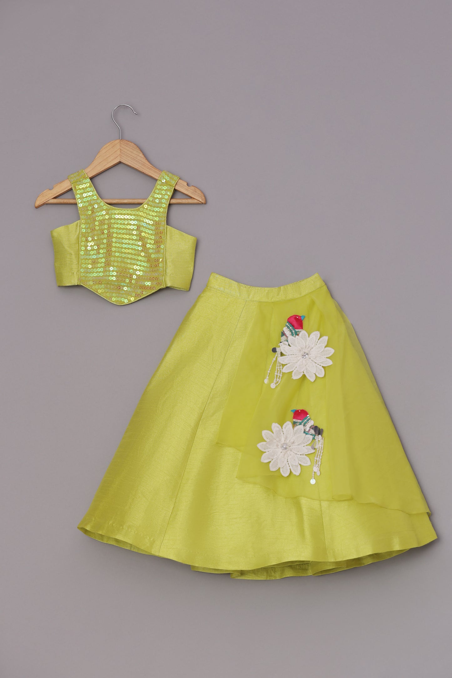 Sequins Embroidered Neon Yellow Top And Fabric Flowers Adorned Flap Lehenga