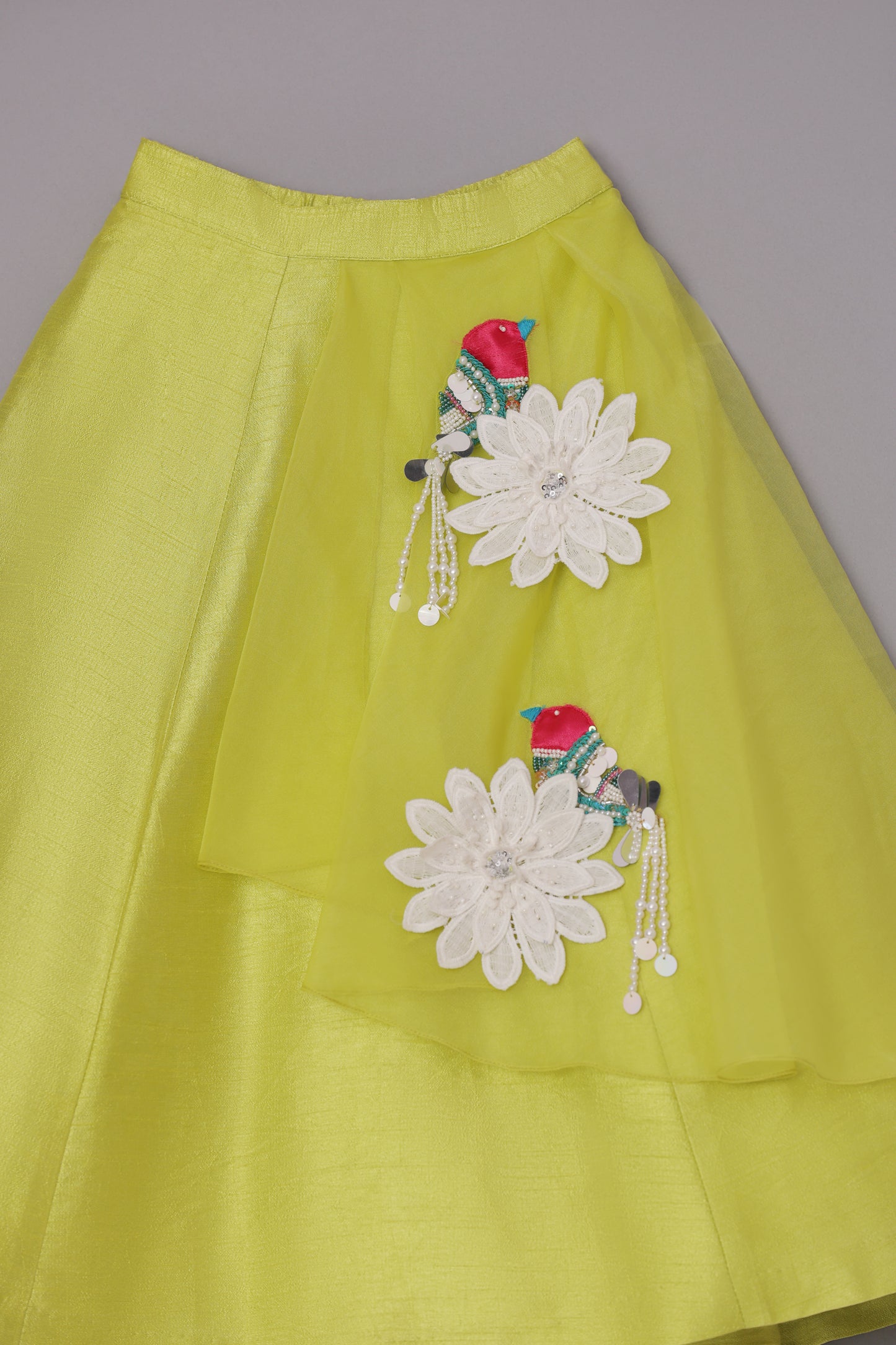 Sequins Embroidered Neon Yellow Top And Fabric Flowers Adorned Flap Lehenga