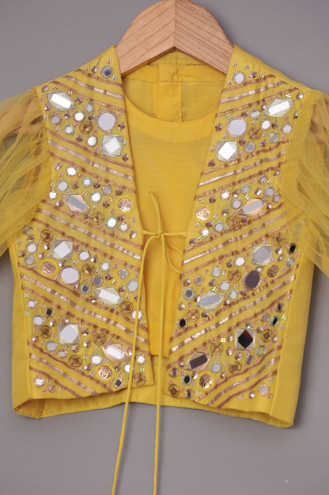 Yellow Crop Top With Mirror Work Tie Up Jacket And Palazzo With Embroidered Waist Pouch